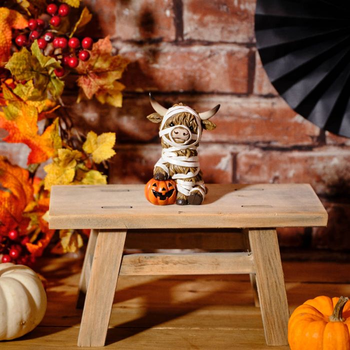 Spooktacular Resin Highland Cow Mummy With Pumpkin Ornament